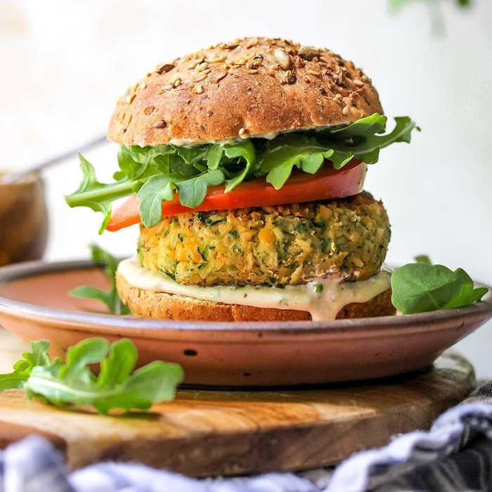 Zucchini-Chickpea Veggie Burgers with Tahini-Ranch Sauce Recipe | EatingWell